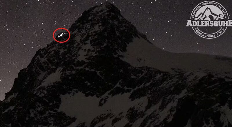 Webcam footage shows the couple's lights start to dim as they become stranded atop the mountain.