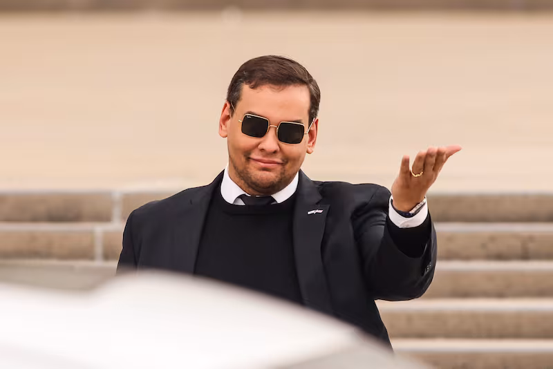 United States Representative George Santos gestures as he leaves the Alfonse M. D'Amato United States Federal court house