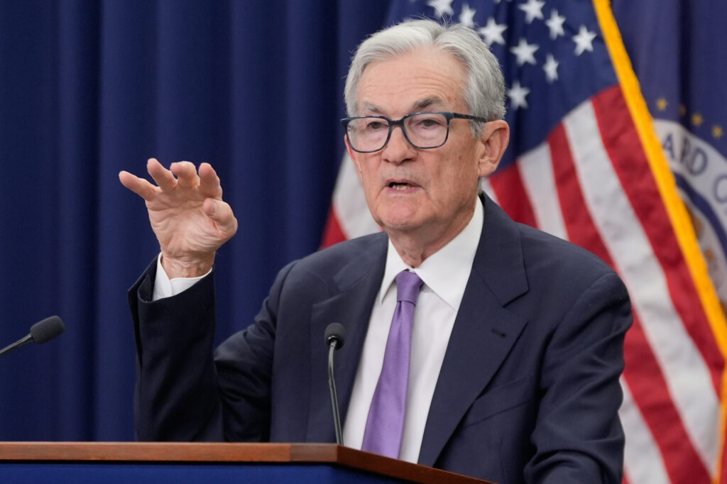 The Federal Reserve cuts rates again, amid mixed economic signals, signals one more cut next year