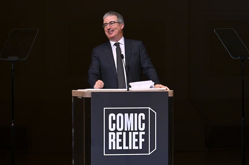 NEW YORK, NEW YORK - DECEMBER 10: John Oliver performs onstage during the Comic Relief Live 2025: A Benefit to Build Brighter Futures for Kids at Carnegie Hall on December 10, 2025 in New York City.