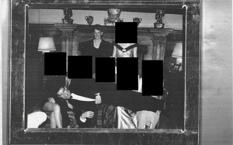 Then-Prince Andrew is pictured in a heavily-redacted photo released as part of the "Epstein files" by the U.S. Department of Justice on December 19, 2025.