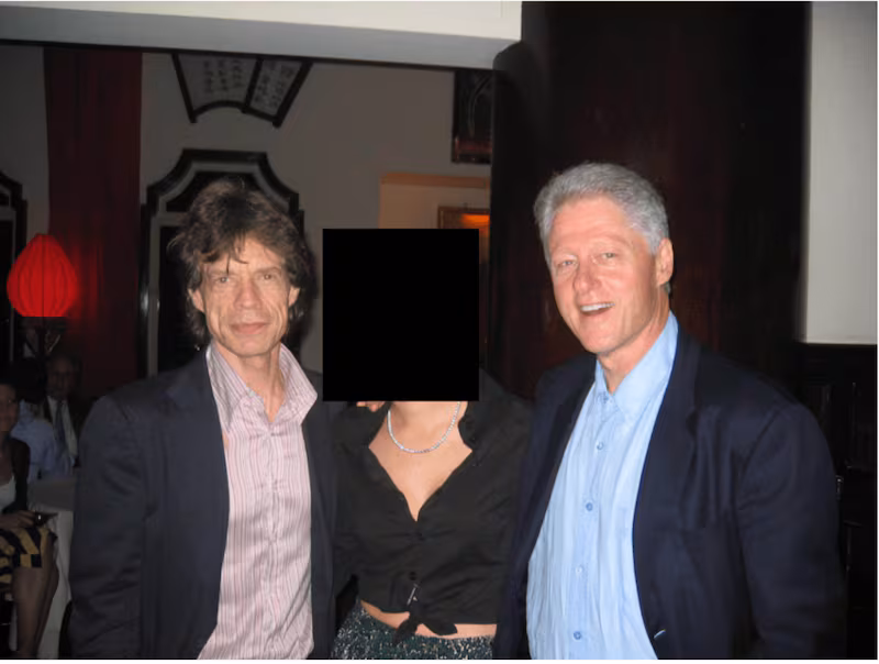 A photo of Mick Jagger, Bill Clinton and an unidentified woman in the Epstein files.