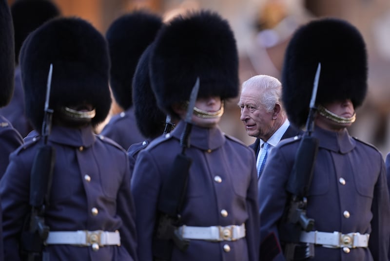 King Charles III inspects the Guard of Honour during the ceremonial welcome at the start of German President Frank-Walter Steinmeier's state visit to the United Kingdom on December 3, 2025 in Windsor, England.