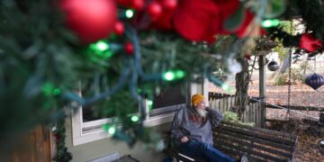 At home known for holiday lights, a dad decorates for possibly the last time