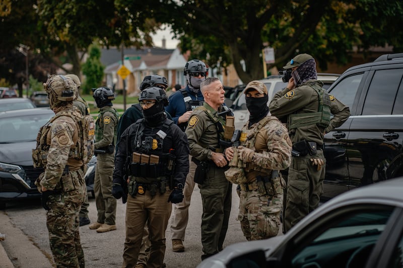 Federal immigration agents led by Chief Patrol Agent Gregory Bovino of the El Centro Sector for U.S. Customs and Border Protection make arrests across the far north side of the city on October 31, 2025, in Chicago, Illinois.