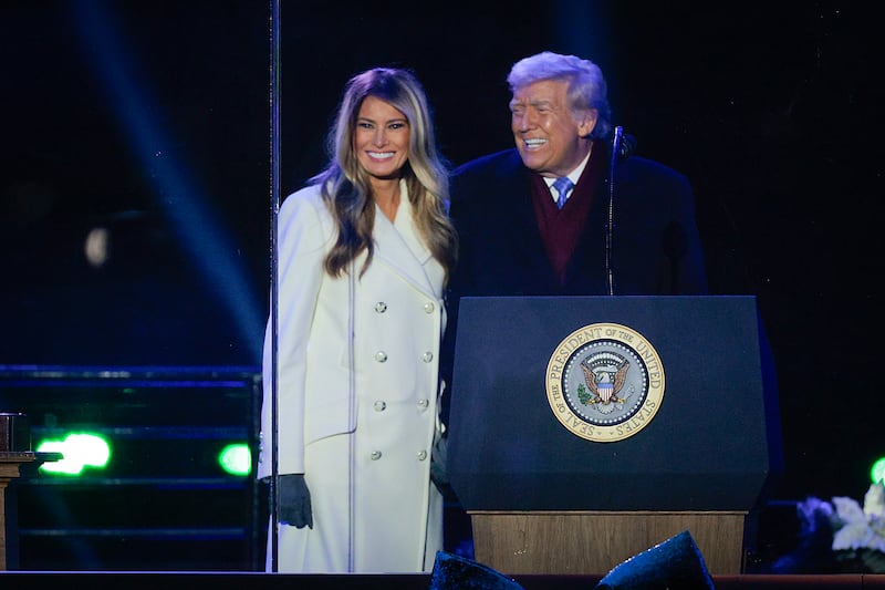 WASHINGTON, DC - DECEMBER 04: U.S. President Donald Trump and first lady Melania Trump participate in the 103rd National Christmas Tree Lighting Ceremony at the White House Ellipse on December 04, 2025 in Washington, DC. The tree is a 32-foot-tall red spruce from the George Washington and Jefferson National Forests in Virginia's Highland County. This is the second year in a row that the George Washington and Jefferson National Forests have provided the tree. (Photo by Chip Somodevilla/Getty Images)
