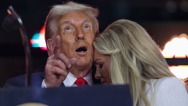 Erika Kirk joins U.S. President Donald Trump onstage during the memorial service for political activist Charlie Kirk at State Farm Stadium on September 21, 2025 in Glendale, Arizona. Kirk, the CEO and co-founder of Turning Point USA, was shot and killed on September 10th while speaking at an event during his "American Comeback Tour" at Utah Valley University. (Photo by Win McNamee/Getty Images)