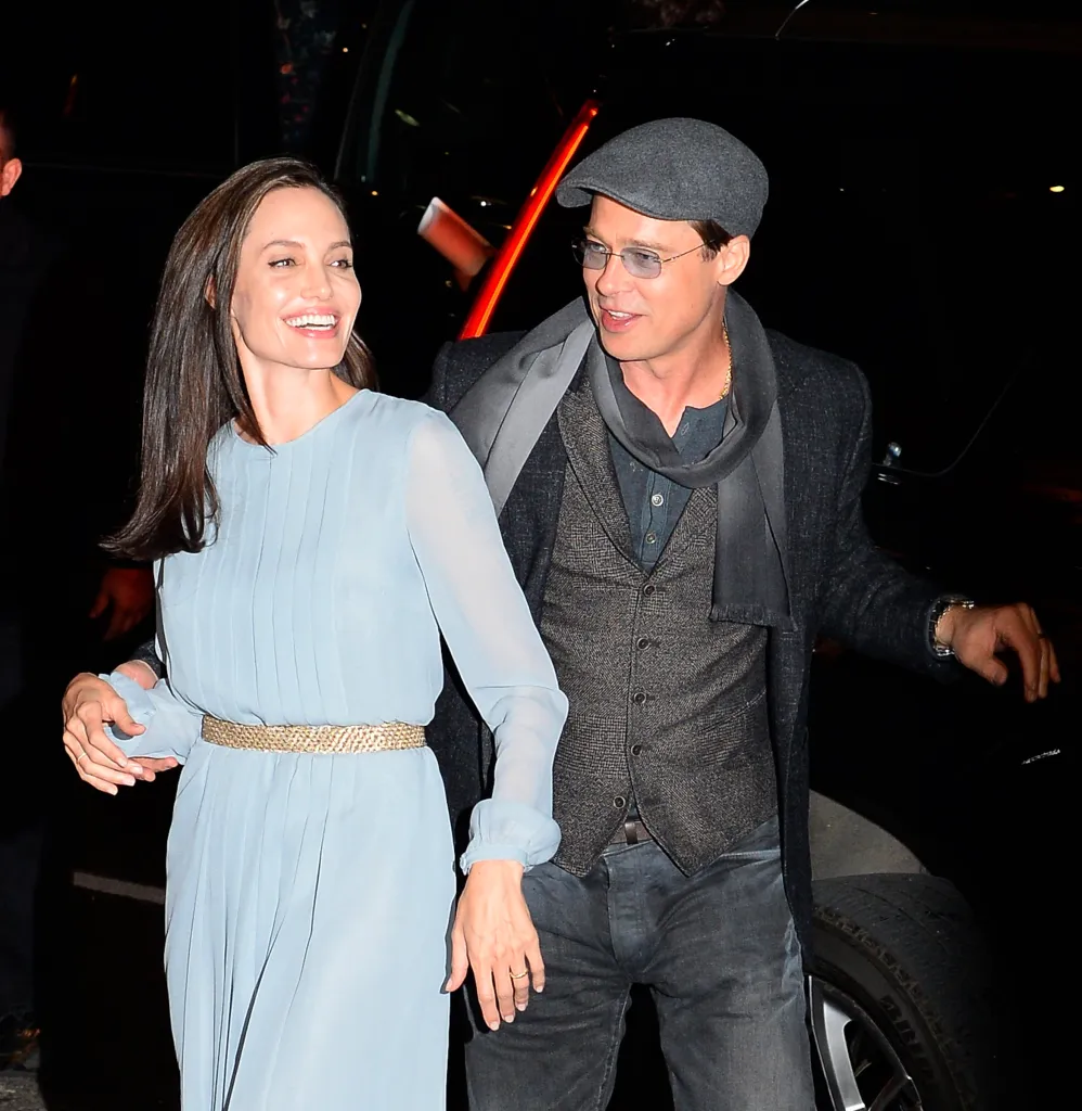 Actors Angelina Jolie and Brad Pitt are seen arriving at City Cinemas in Midtown on November 3, 2015 in New York City.