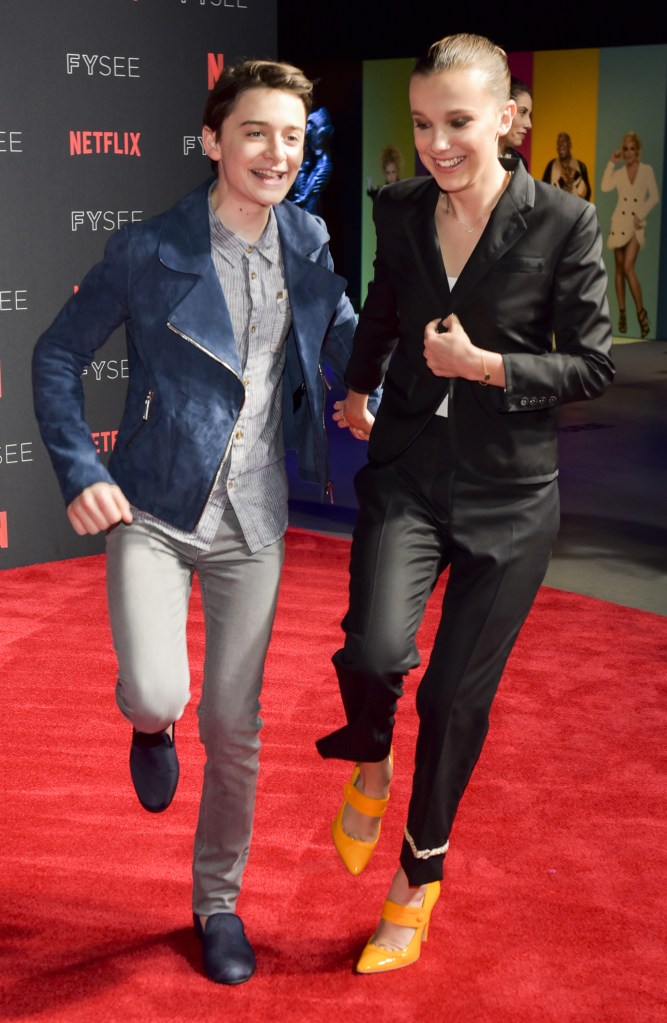 Noah Schnapp and Millie Bobby Brown at a