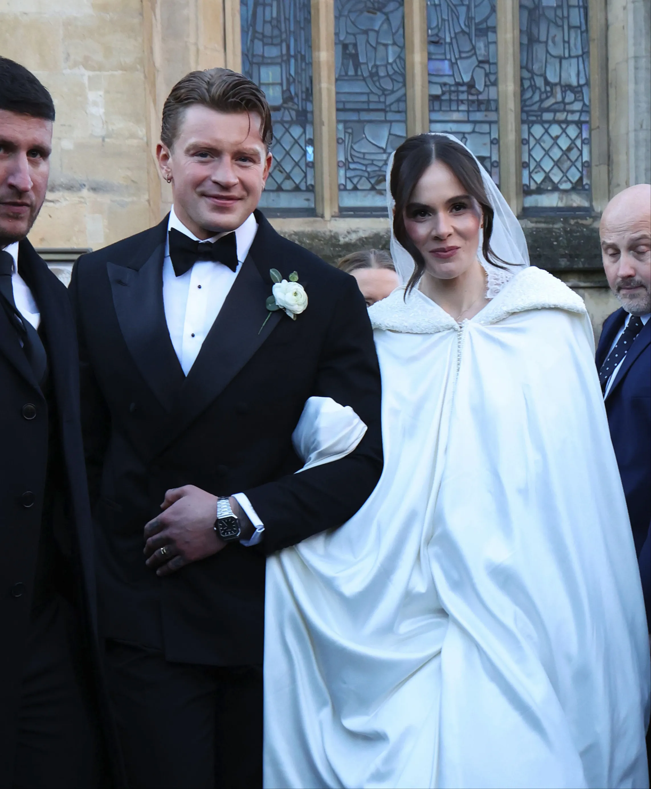Adam Peaty and Holly Ramsay leaving their wedding at Bath Abbey.