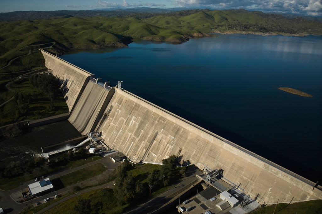Aerial view of Friant Dam holding back Millerton Lake.