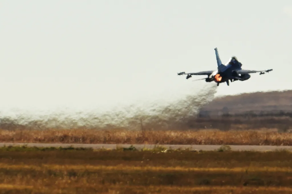 Parks simultaneously led a four-ship of F-16s on a SEAD mission, drawing enemy fire to clear a path for the rest of the force.