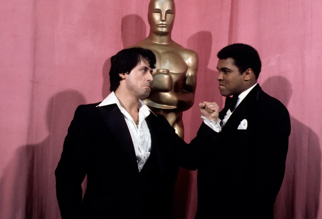 Stallone and boxing legend Muhammad Ali at the 49th Academy Awards.
