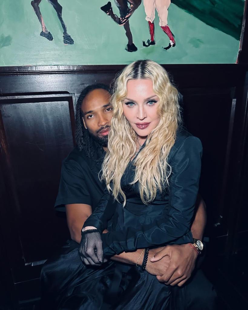 Madonna posing with her boyfriend Akeem Morris.