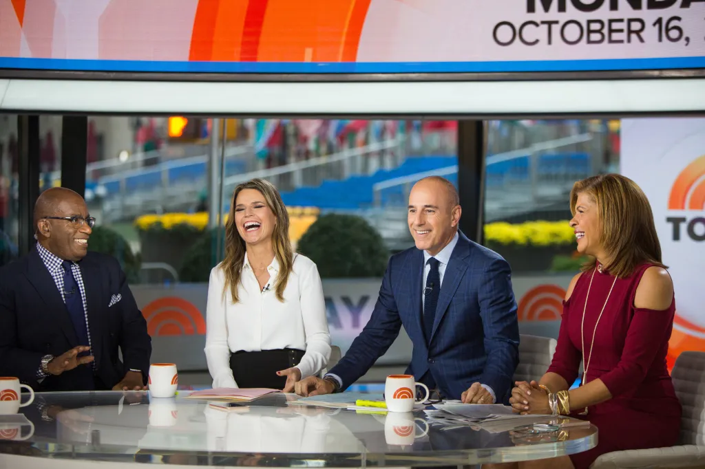 Al Roker, Savannah Guthrie, Matt Lauer, and Hoda Kotb laughing during a Today show broadcast.