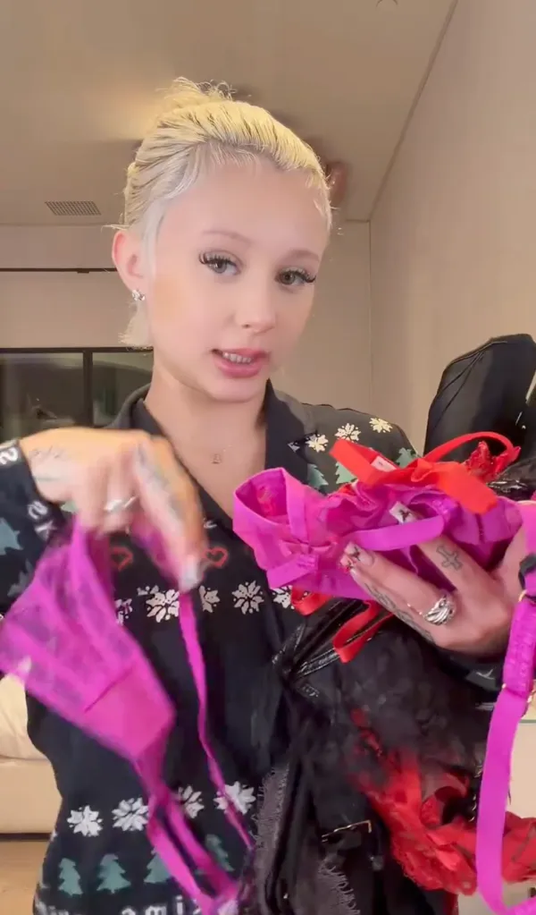 Alabama Barker showing off a haul of lingerie and other items.