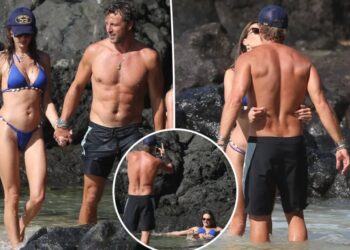 Alessandra Ambrosio puts boyfriend to work as her personal photographer during beach bikini shoot
