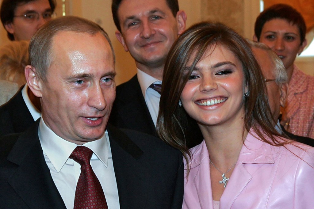 Alina Kabaeva and Vladimir Putin at an event in Kremlin