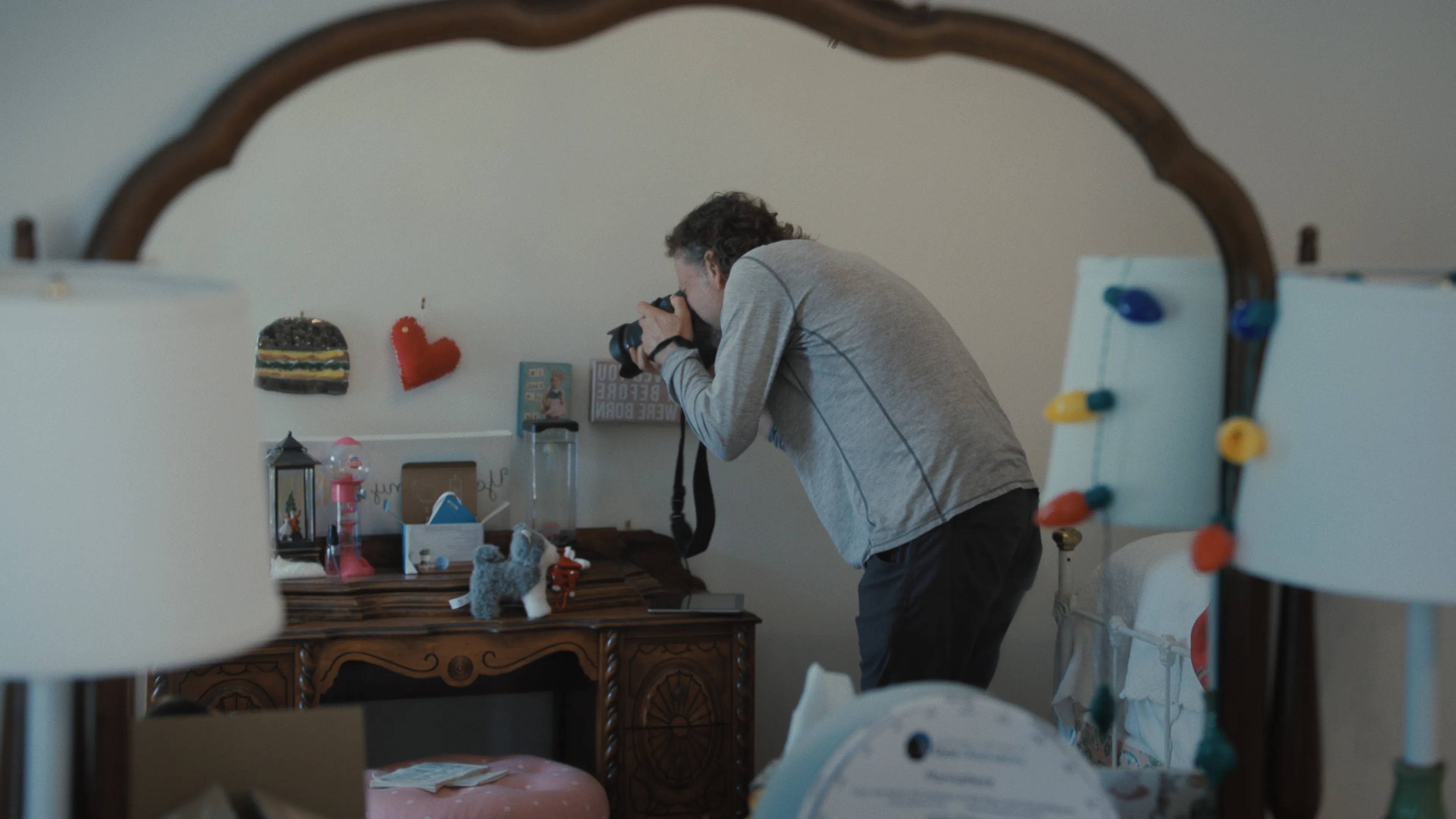 Photographer Lou Bopp in the Netflix documentary All The Empty Rooms.
