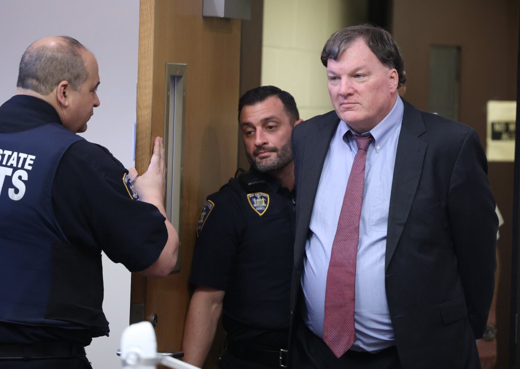 Alleged Gilgo serial killer Rex Heuermann is escorted into courtroom at Suffolk County Court in Riverhead on Tuesday, April 16, 2025.