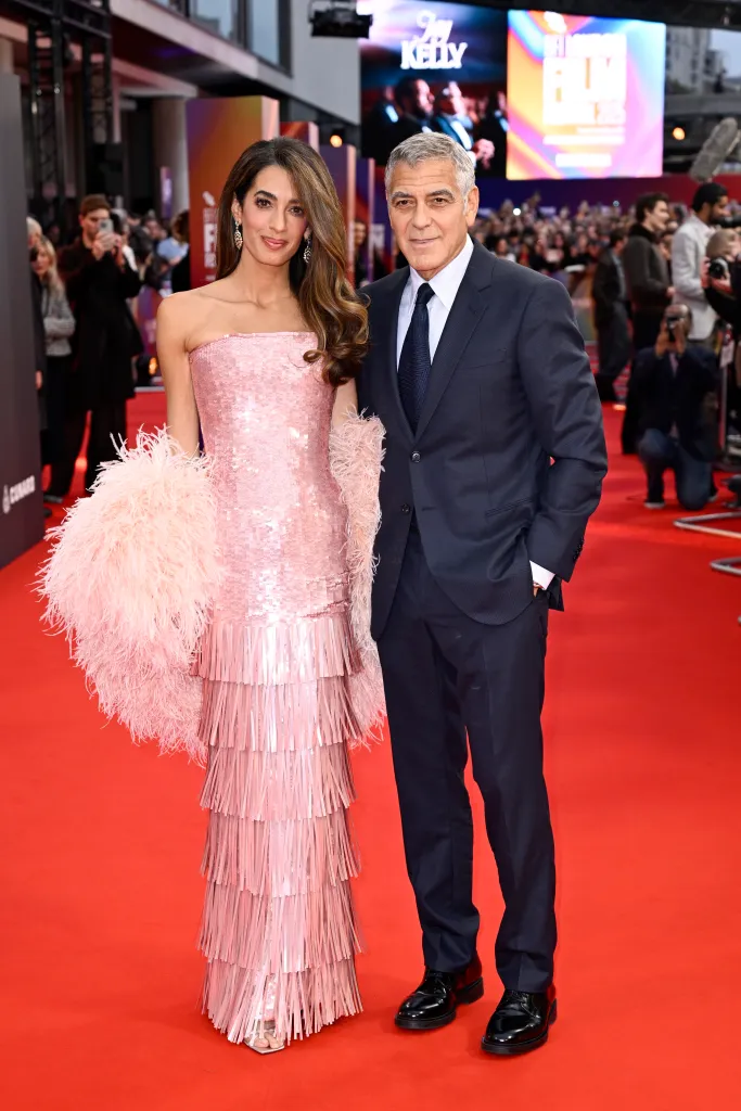 Amal Clooney and George Clooney attending the 