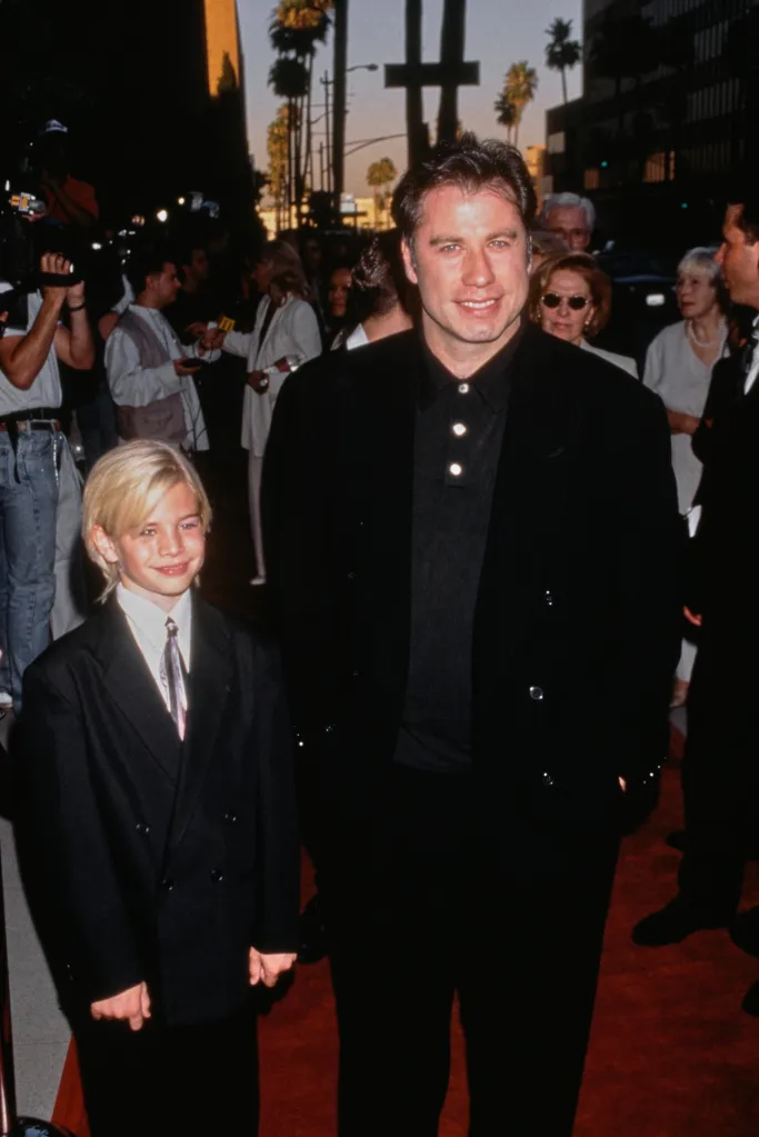 John Travolta and son Jett Travolta attending the premiere of Jon Turteltaub's 'Phenomenon'.