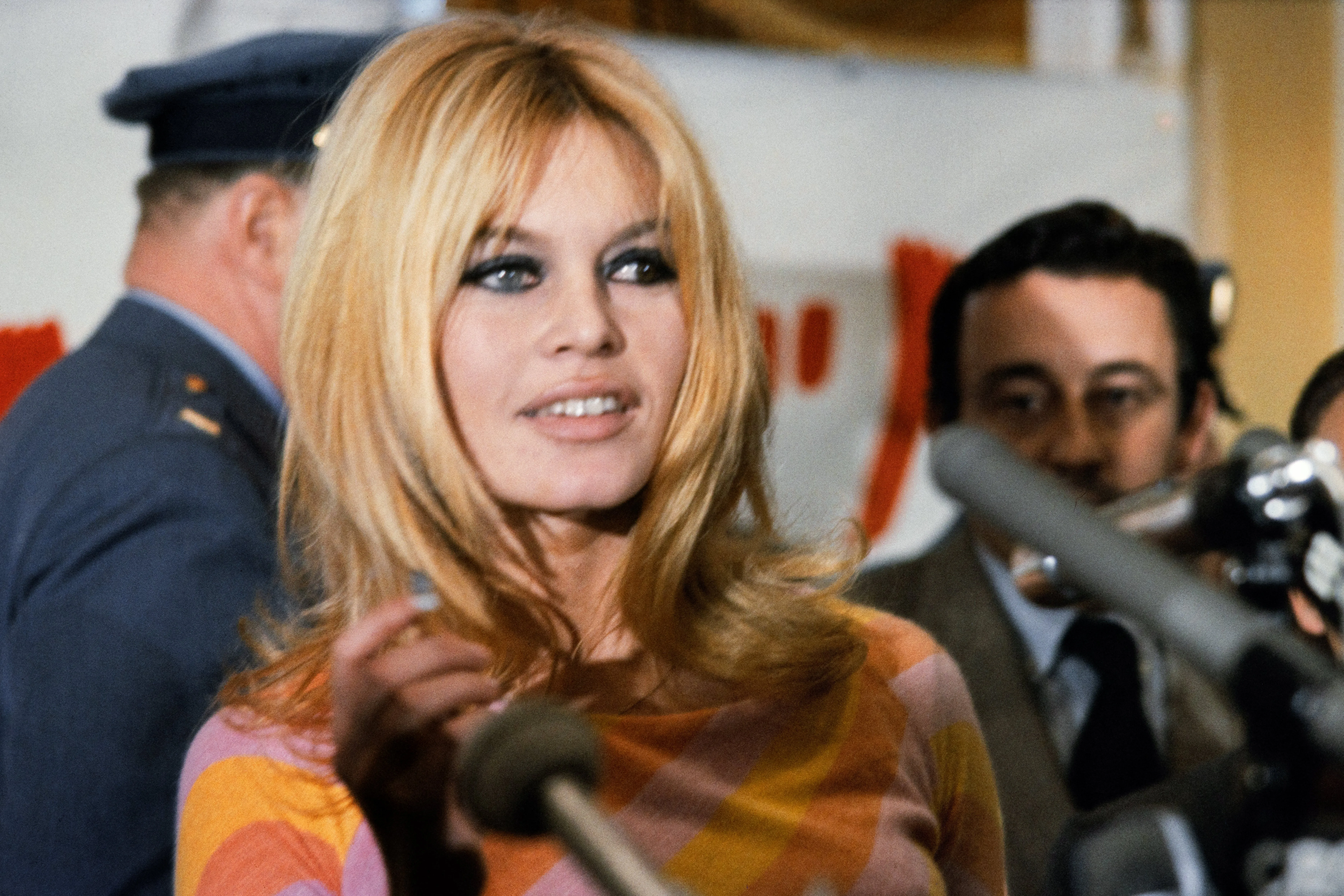 Brigitte Bardot speaking at a press conference for the film 