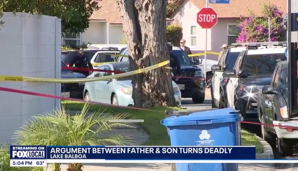 Scene of a deadly family dispute with police cars and crime scene tape.