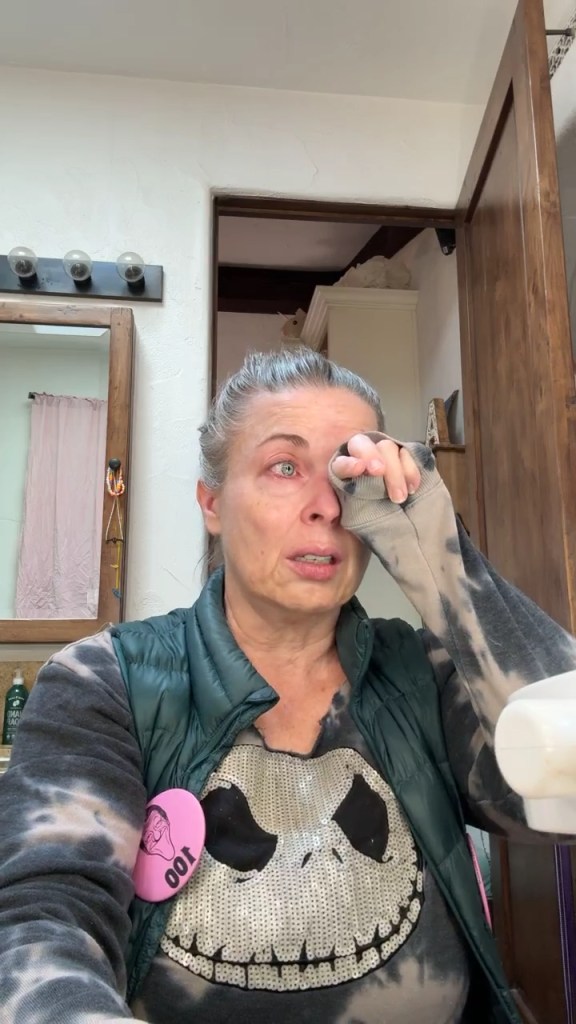 Arlene Silver wiping her eye.