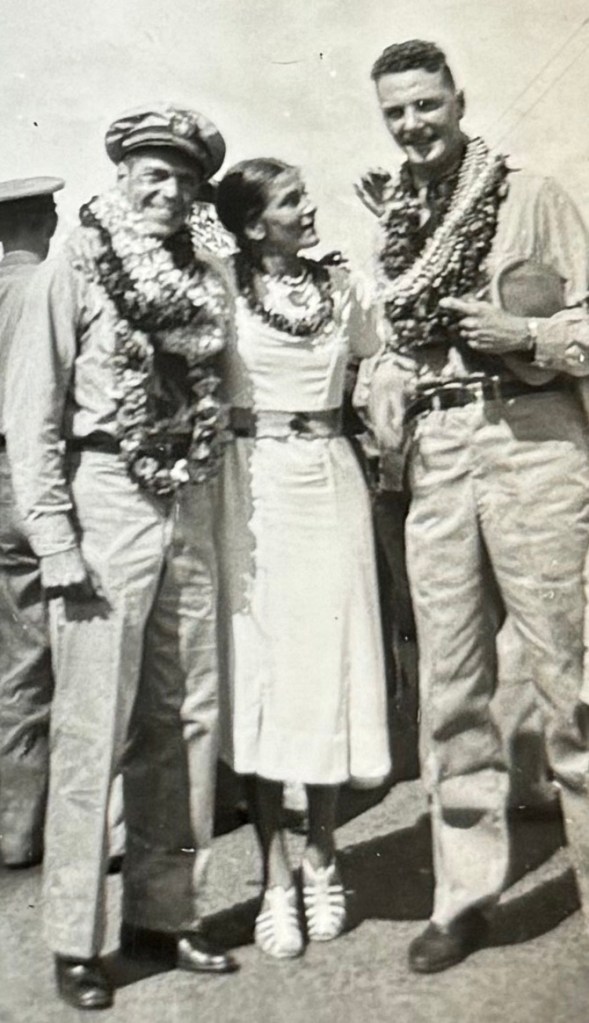 Ruth, two sailors, and another person at a gathering.