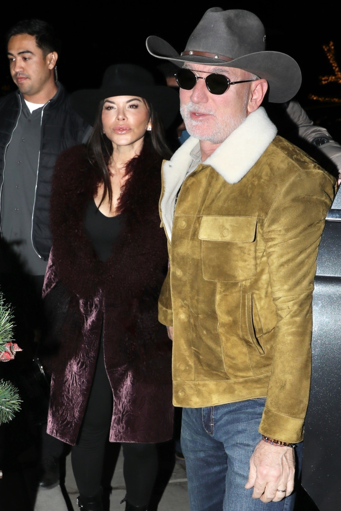 Jeff Bezos in a cowboy hat and Lauren Sánchez in a black hat outside Kemo Sabe in Aspen.