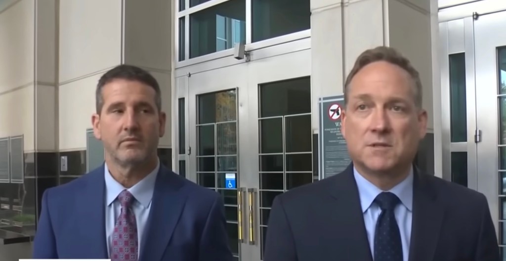 Sacramento lobbyist Greg Campbell (left) and his attorney, Todd Pickles (right), standing in front of a building.