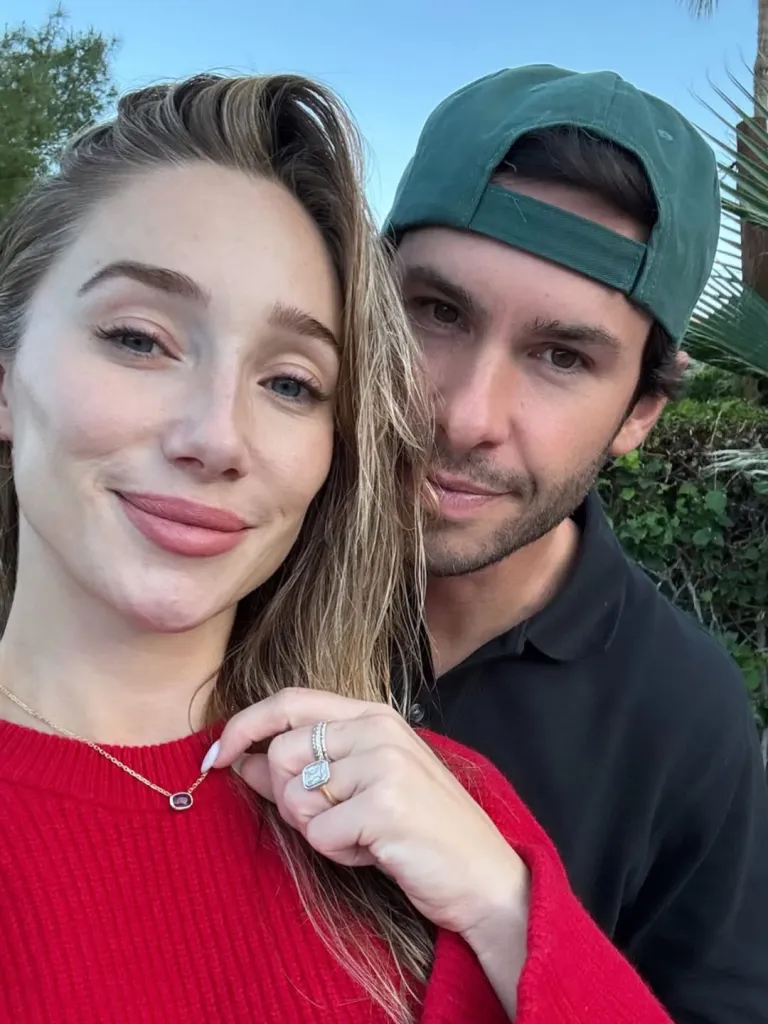 Aurora Culpo and fiance Zac posing for a selfie.