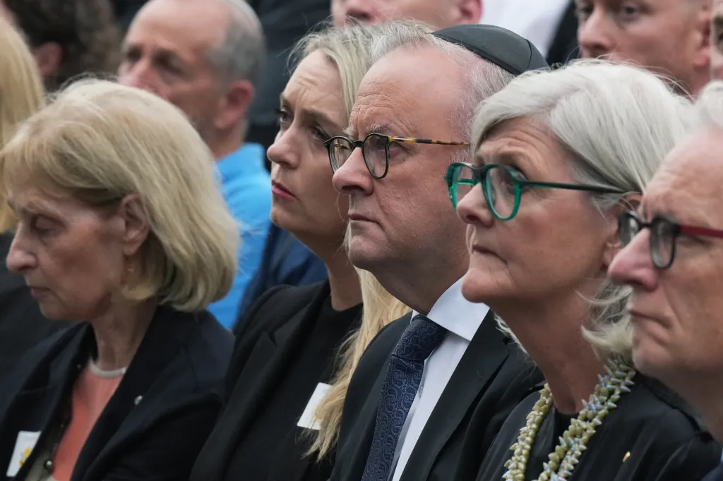 Australian Prime Minister Anthony Albanese and his wife look on during the ceremony to mark the National Day of Reflection on Dec. 21, 2025.