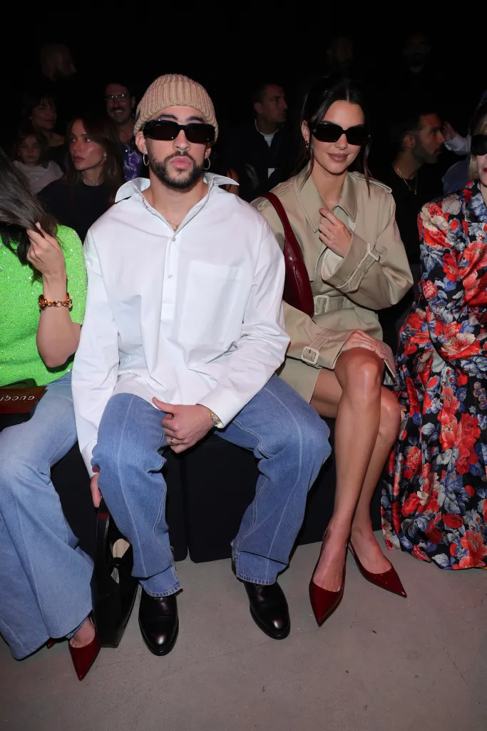 Bad Bunny and Kendall Jenner sitting at the Gucci Ancora show during Milan Fashion Week.