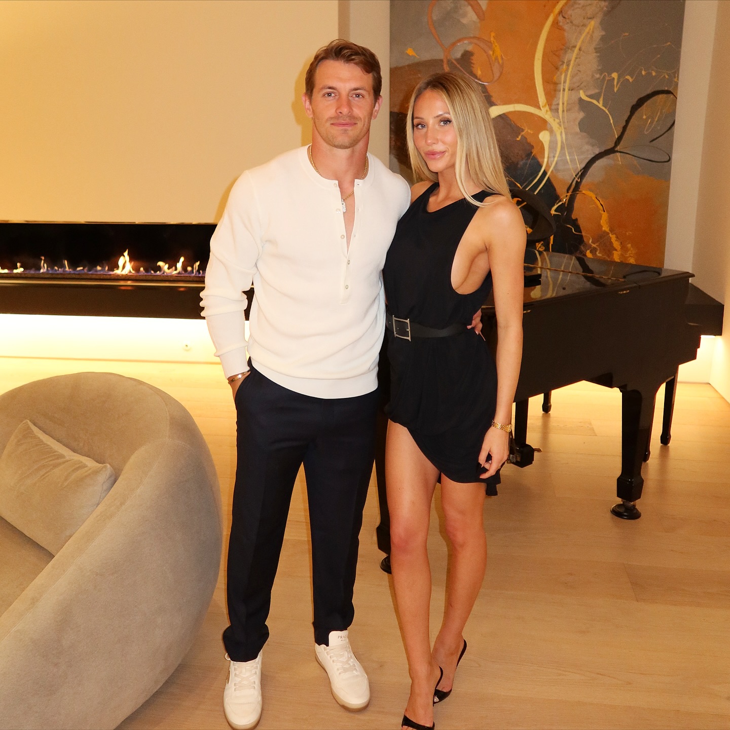 Braxton Berrios and Alix Earle posing for a photo.