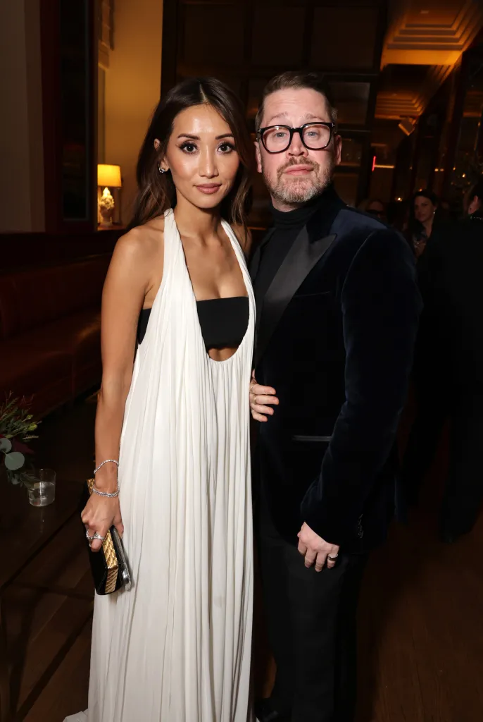 Brenda Song and Macaulay Culkin posing at the 