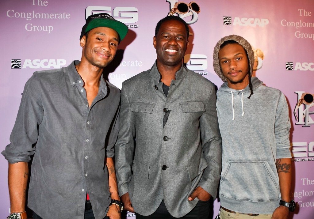 Brian McKnight Jr., Brian McKnight, and Niko McKnight pose at the 