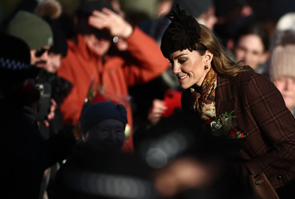 Catherine, Princess of Wales, smiles while greeting well-wishers.