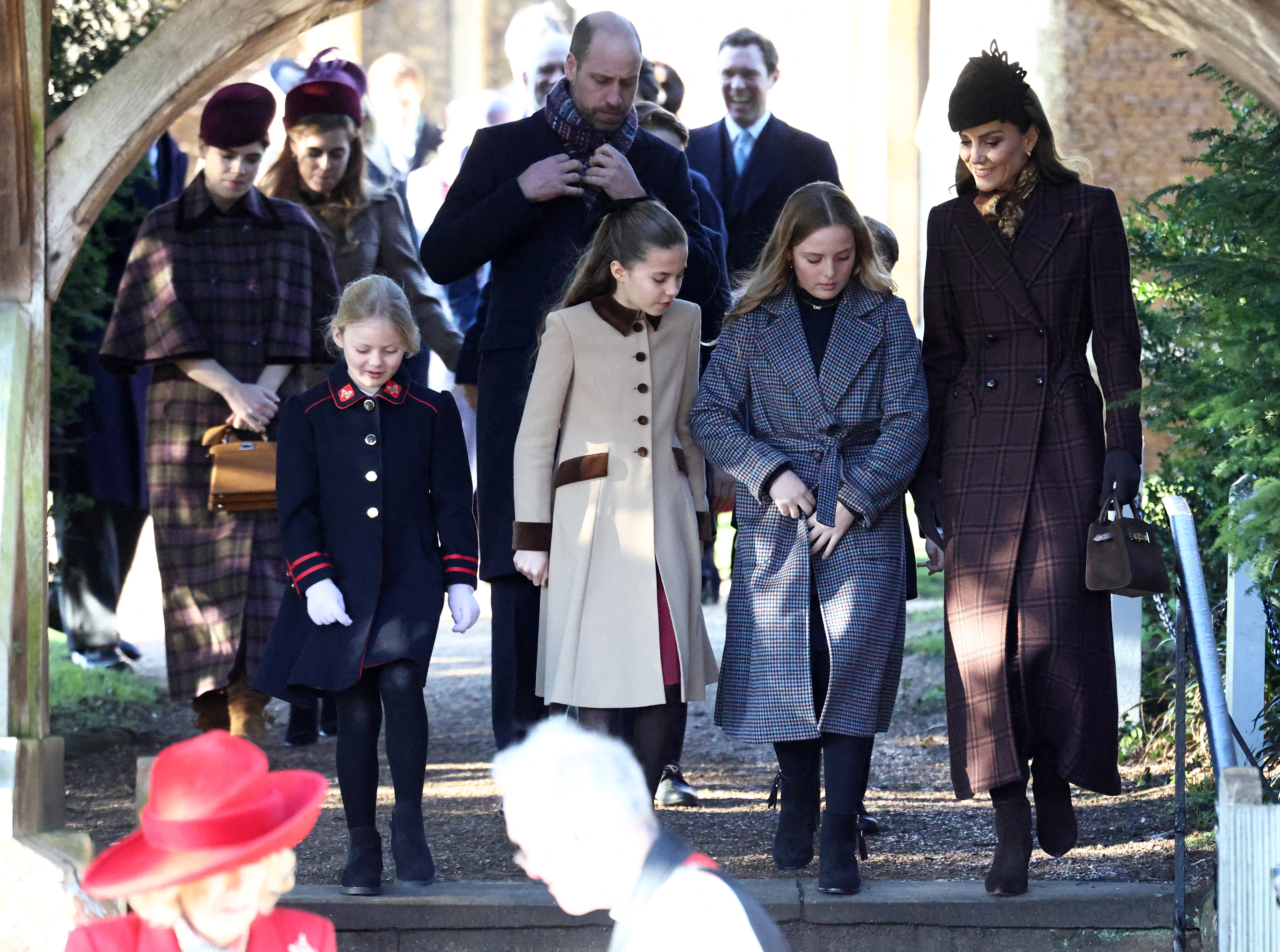 Princess Eugenie of York (L), Britain's Princess Beatrice of York (2L), Britain's Prince William, Prince of Wales (C), Britain's Princess Charlotte of Wales (C) and Britain's Catherine, Princess of Wales (R).