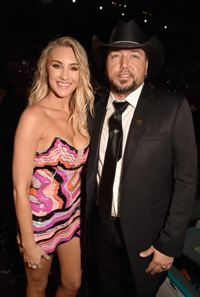 Brittany Kerr and Jason Aldean posing at the 53rd Academy of Country Music Awards.