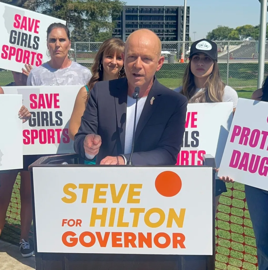 California gubernatorial candidate Steve Hilton speaks at a podium with 