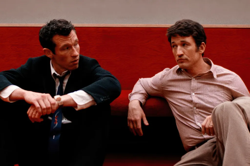 Callum Turner as Luke Miles Teller as Larry.