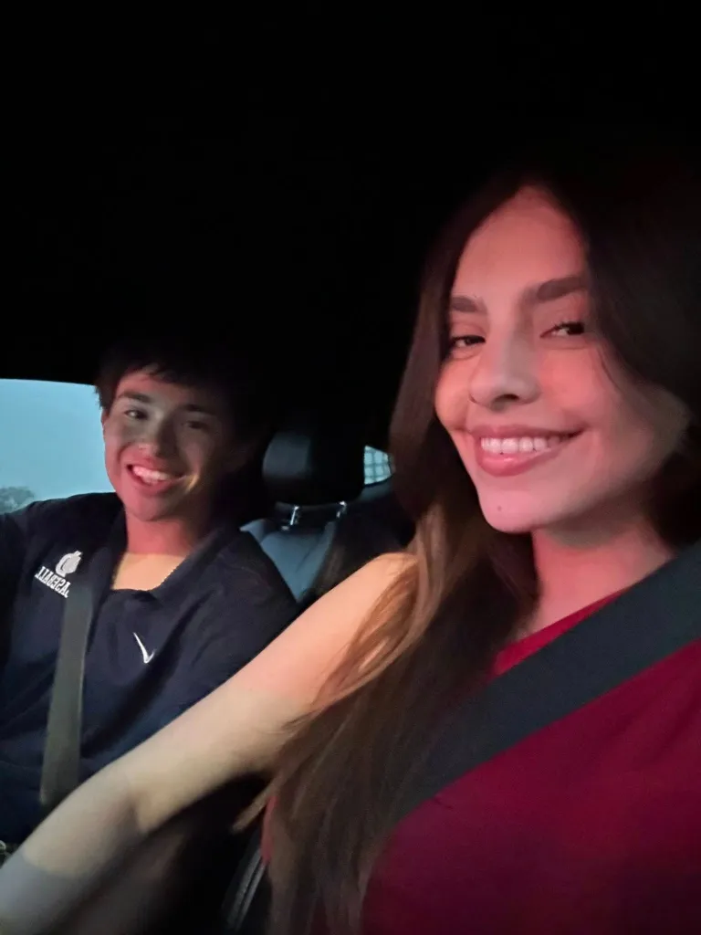 Camila Mendoza Olmos and Nathan Gonzales in a car.