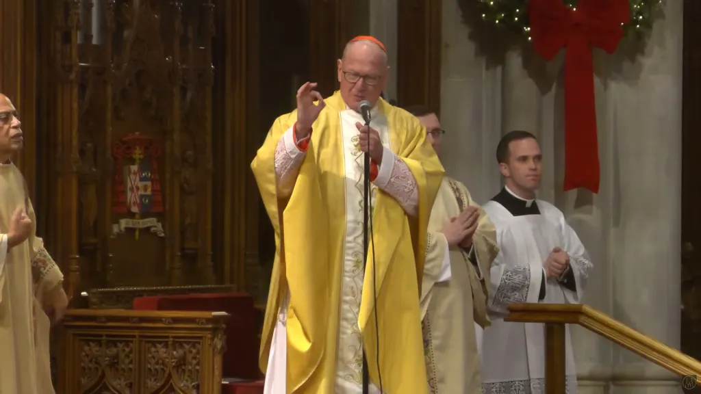 Cardinal Timothy Dolan speaking at the final midnight mass at St. Patrick's Cathedral.