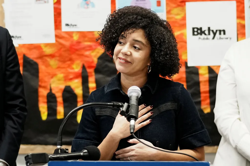Catherine Almonte Da Costa speaking at a press conference.