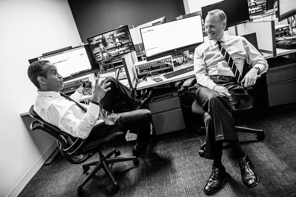 CBS News Co-Anchors, John Dickerson and Maurice DuBois, sitting in an office.