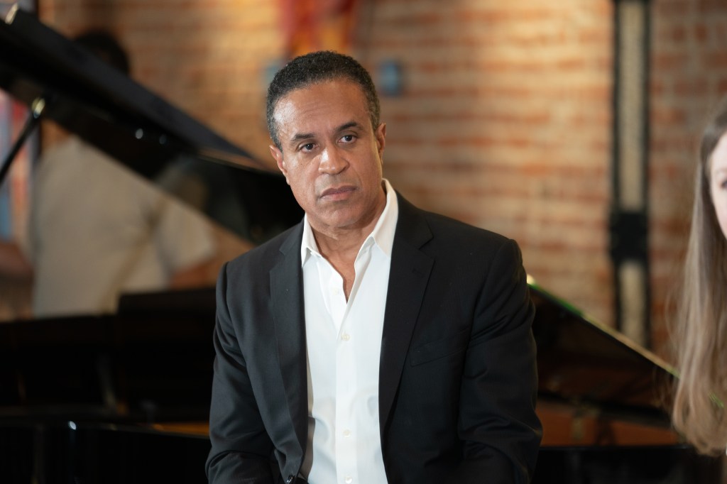 Maurice Dubois, a CBS TV personality, moderates the Changing the World Series Panel.