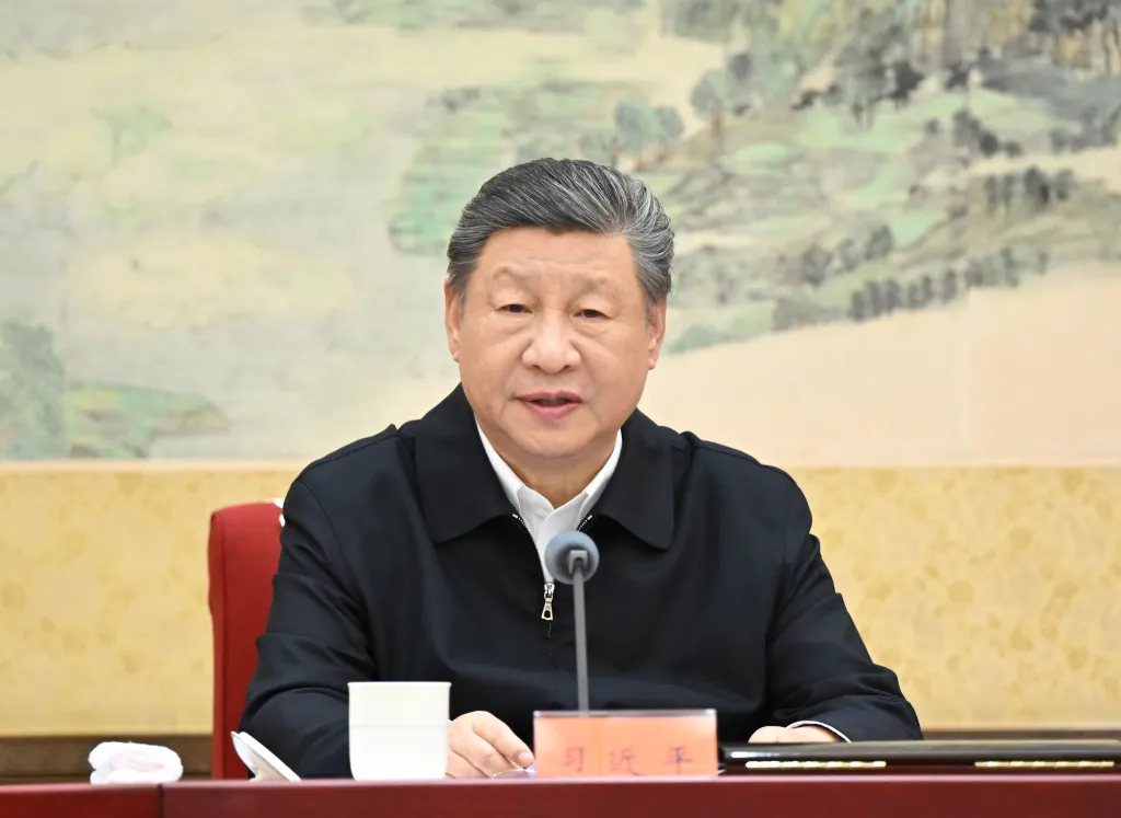 President Xi Jinping delivering a speech at a CPC Central Committee Political Bureau meeting.