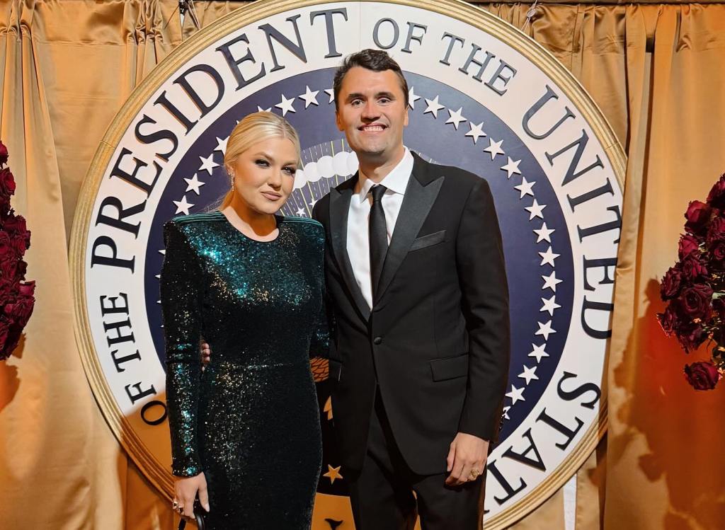 Charlie Kirk and his wife, Erika Frantzve, pose in front of the Seal of the President of the United States.